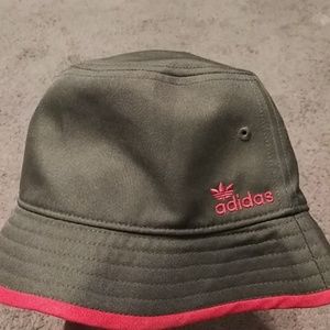 Brown and neon orange adidas hat
